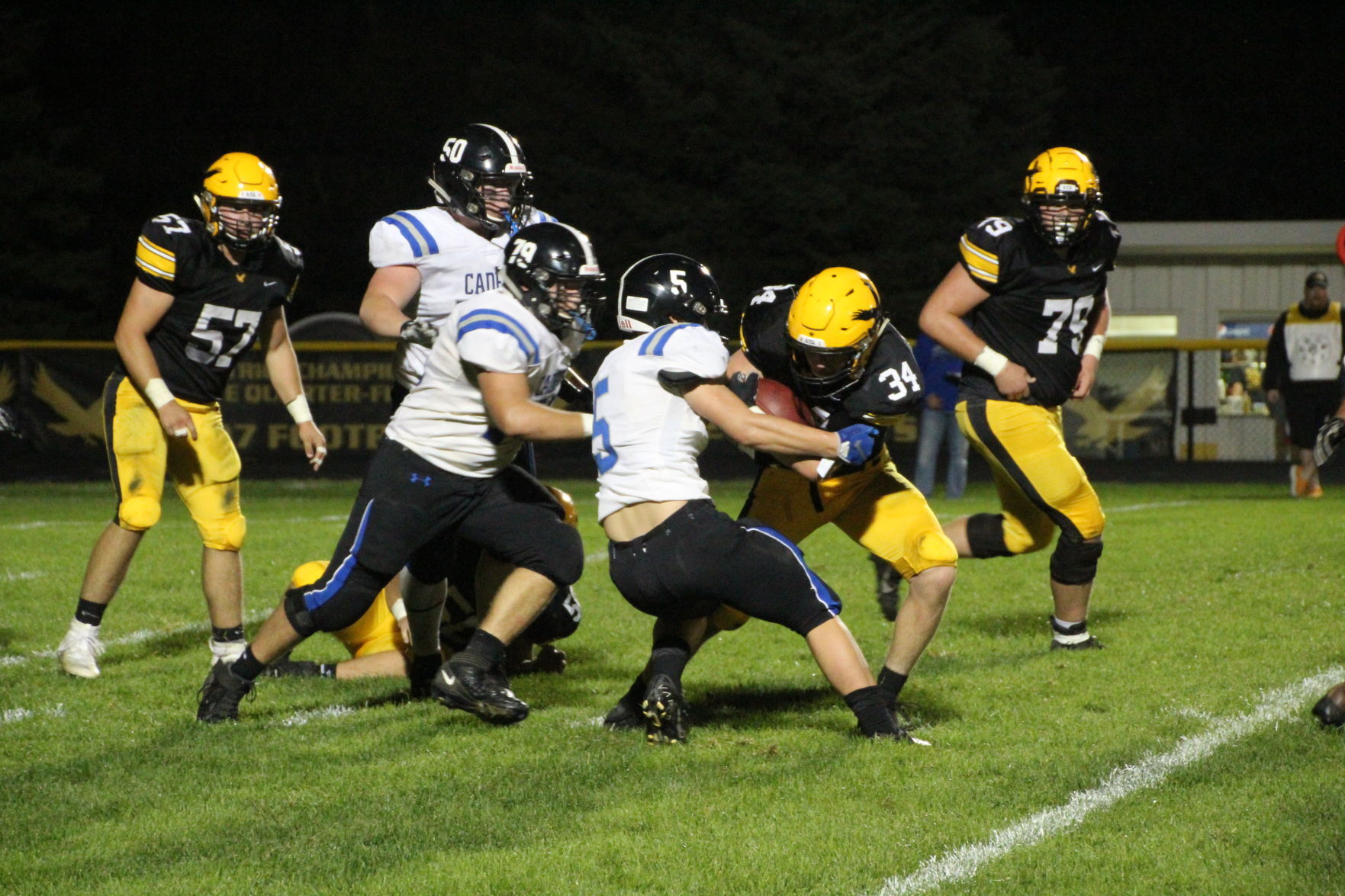 Leonard fights for yards